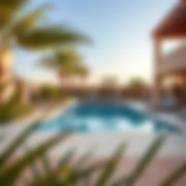 Villa pool area with serene landscaping and outdoor seating