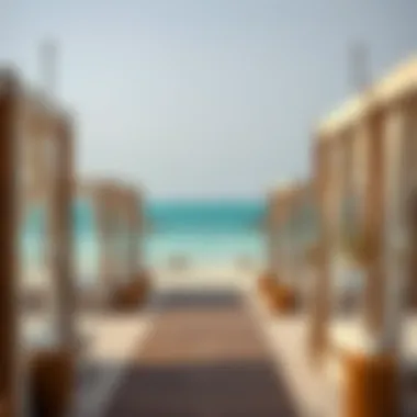 Luxurious cabanas lining the beach with crystal clear waters